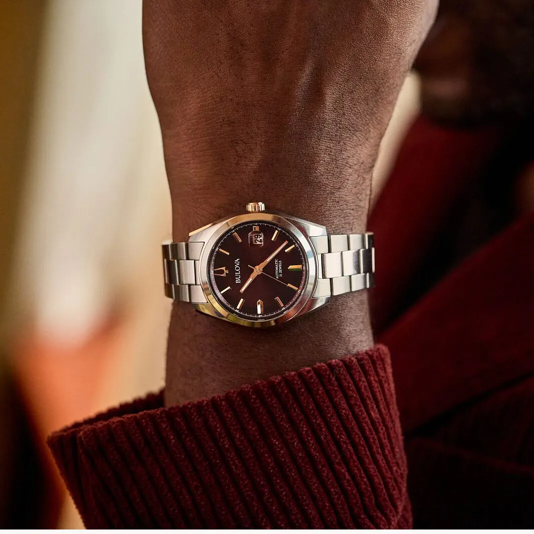 The Bulova Surveyor Burgandy on wrist.