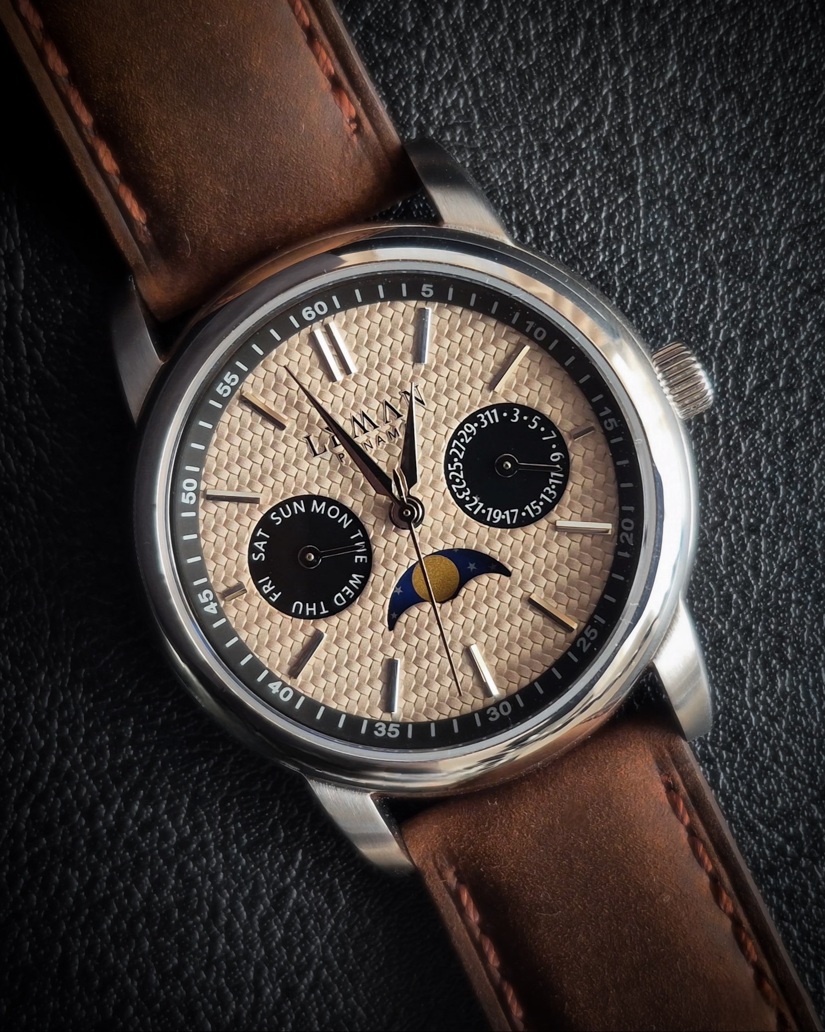 Picture of the Leman Panama moonphase watch with a brown leather strap.