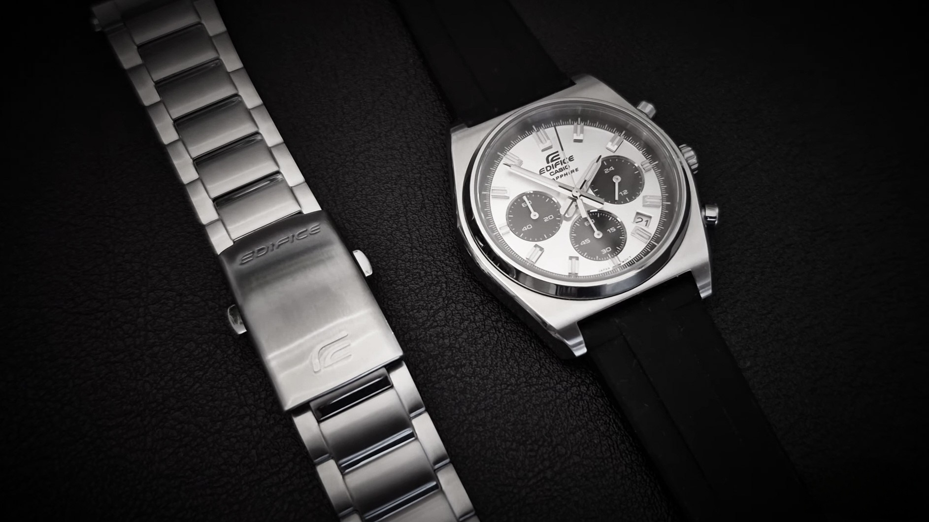 Photo of the Casio Edifice EFB-730D-7AV with a black WIS rubber strap next to the stainless steel bracelet