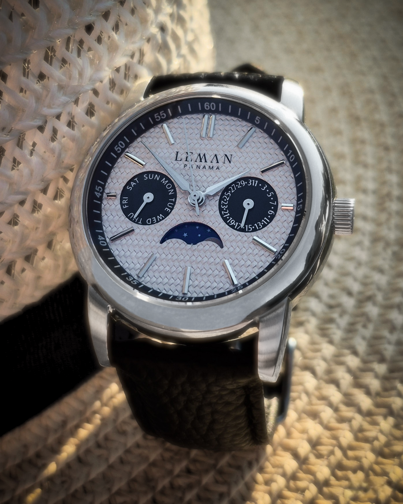 Leman Panama watch against a panama hat.